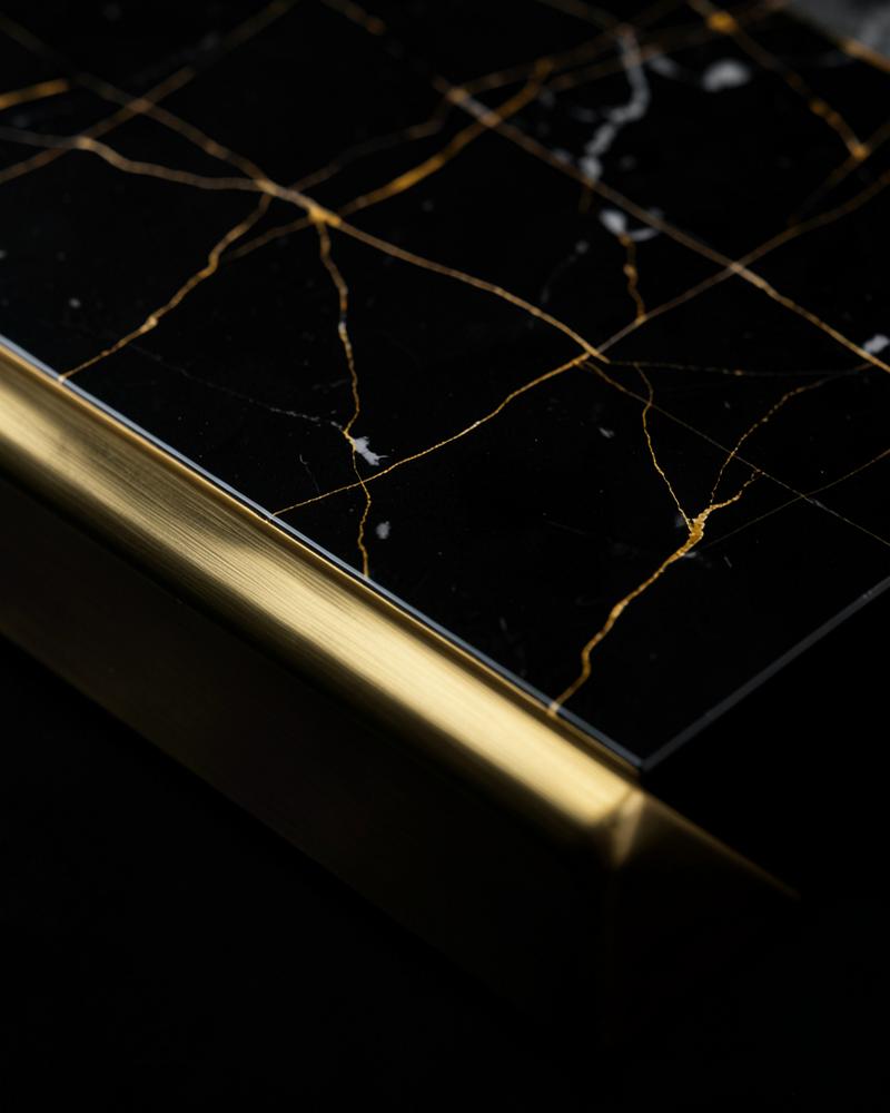 Black marble and brushed brass edge